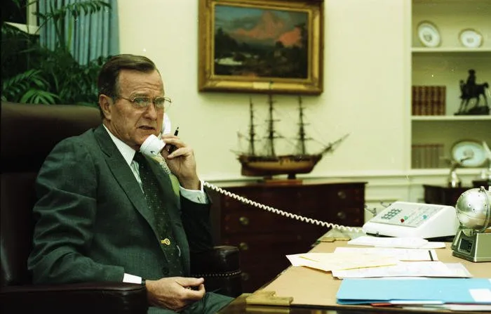 President Bush has a telephone conversation with Prime Minister Margaret Thatcher