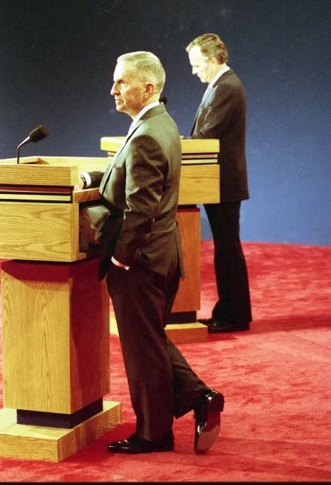 President Bush participates in the third and final Presidential Debate between himself, Governor Bill Clinton, and Ross Perot in East Lansing, Michigan