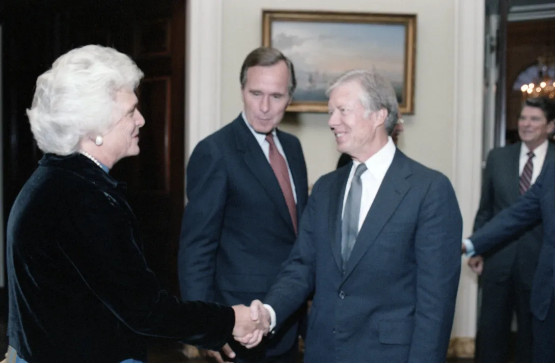 Second Lady Barbara Bush greets former  President Jimmy Carter during an event in which former Presidents Carter, Ford, and Nixon and their spouses met with the Reagans and Bushes before departing to Egypt to attend the funeral of slain Egypt President...