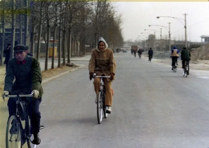 George Bush Riding a Bicycle Home from the International Club in China