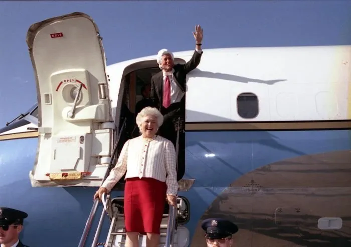 Barbara Bush and Marvin arrive at Westchester County Airport. Marvin wearing Barbara Bush mask