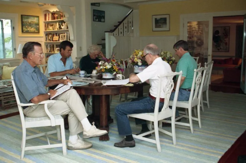 President Bush meets with General Scowcroft and Andy Card at the dining room
