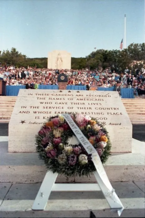 President Bush addresses the crowd at the National Memorial Cemetery of the Pacific after laying a wreath at the monument honoring service members who are missing in action.