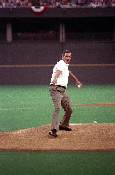 Vice President Bush throws out the first pitch at the All Star Baseball Game,  Cincinnati, OH,