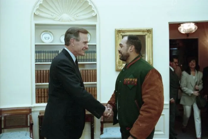 President Bush meets with Reggie Jackson in the Oval Office to congratulate him on being inducted into the Hall of Fame
