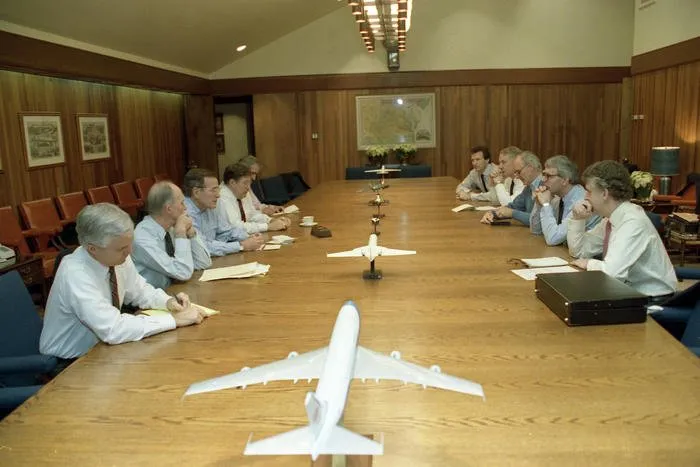 President Bush meets with British Prime Minister John Major in the Conference Room at Laurel Lodge, Camp David