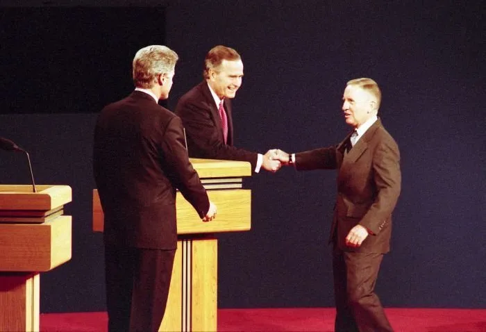 President Bush participates in the third and final Presidential Debate between himself, Governor Bill Clinton, and Ross Perot in East Lansing, Michigan