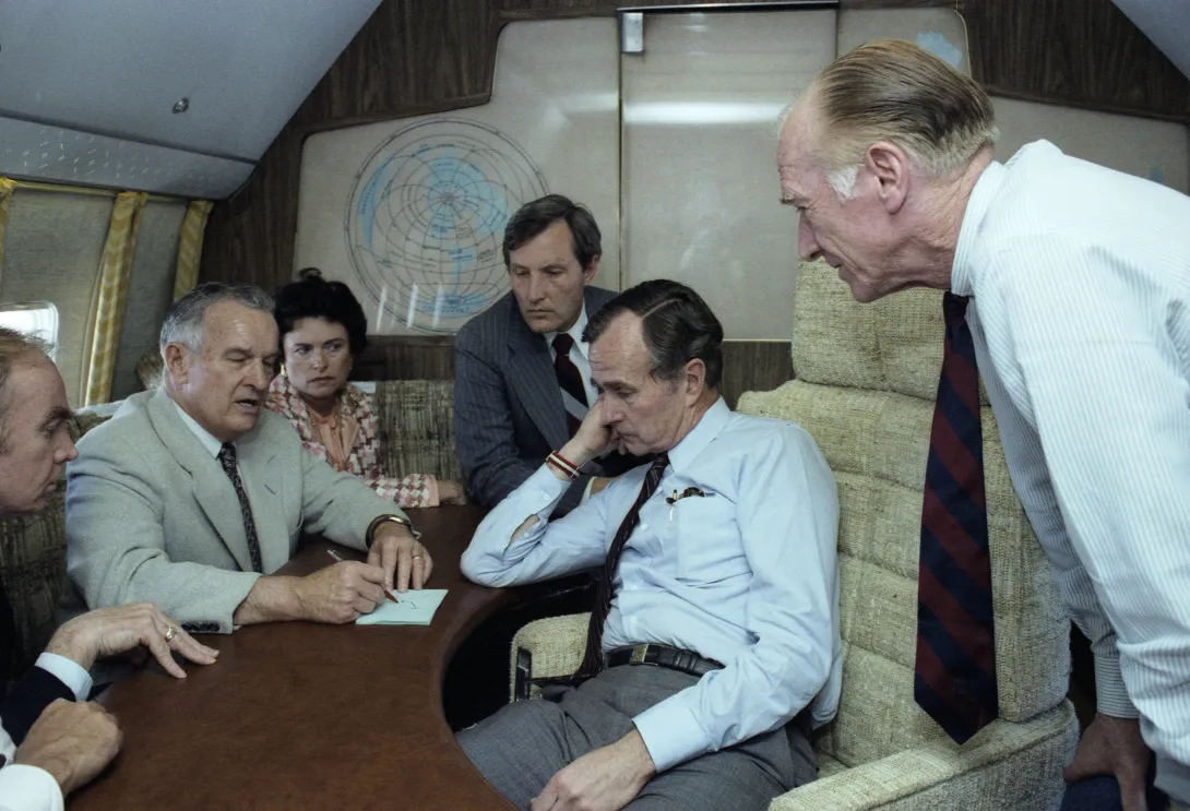 Vice President Bush on Air Force 2 headed back to Washington, DC after the assassination attempt on President Reagan