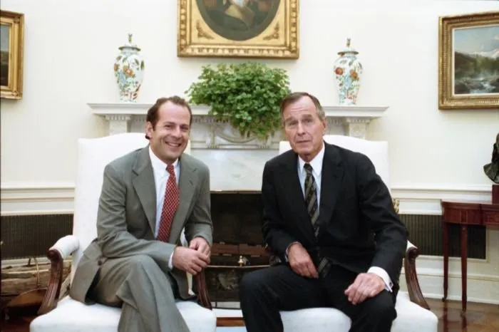 President Bush meets with actor Bruce Willis in the Oval Office