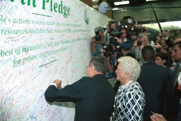 President Bush and Barbara Bush add their signatures to the "Earth Pledge"