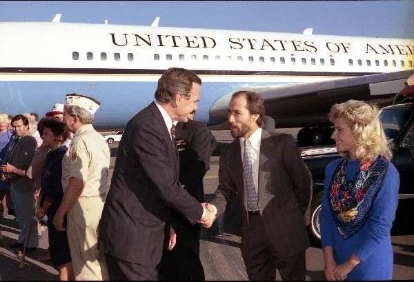 Vice President Bush meets with supporters, including singer Lee Greenwood, on a campaign stop in Redding, California