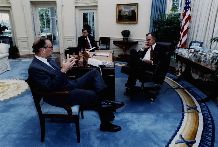 President Bush meets with Alan Greenspan and Governor Sununu in the Oval Office