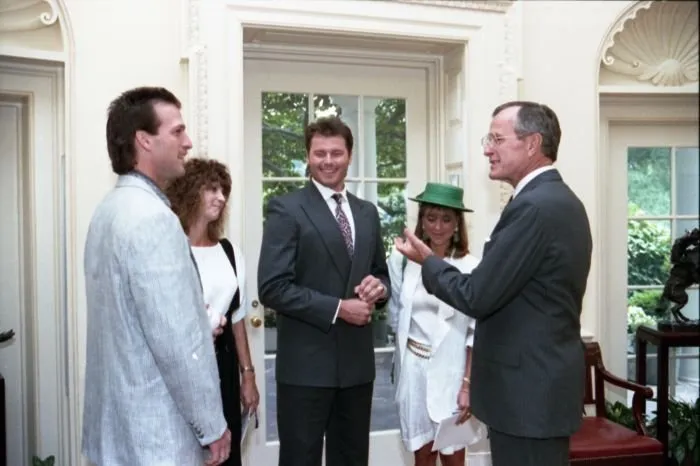 President Bush meets with Nick Esasky, Roger Clemens, and their wives in the Oval Office