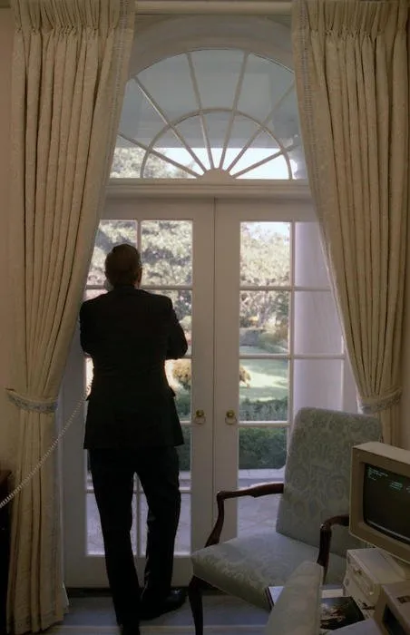 President Bush on the telephone in the outer Oval Office