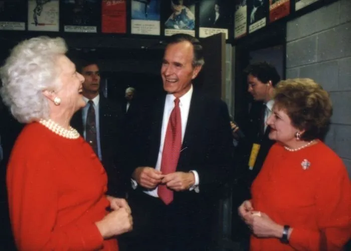 President and Mrs. Bush share a laugh with Helen Thomas following the third Presidential Debate in East Lansing, Michigan