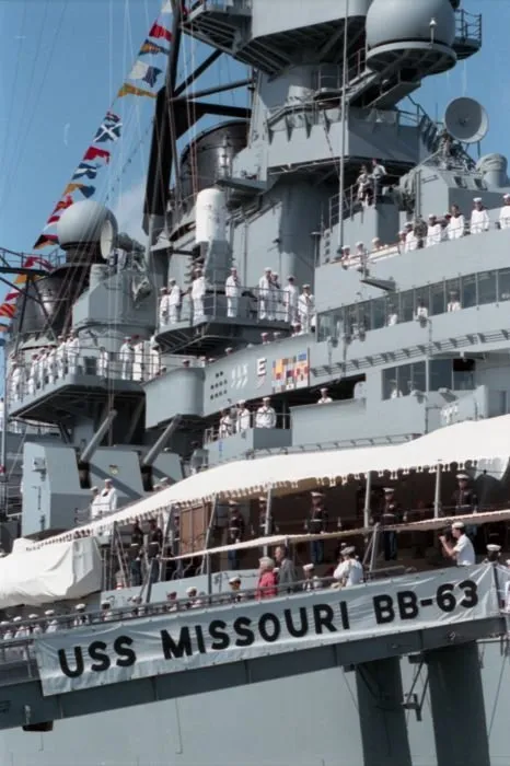 President Bush and Mrs. Bush walk down the gangplank of the USS Missouri in Pearl Harbor, Hawaii on the 50th anniversary of the Japanese attack on Pearl Harbor.