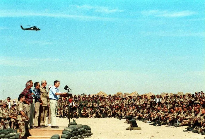 President Bush addresses the troops in Saudi Arabia during his Thanksgiving visit