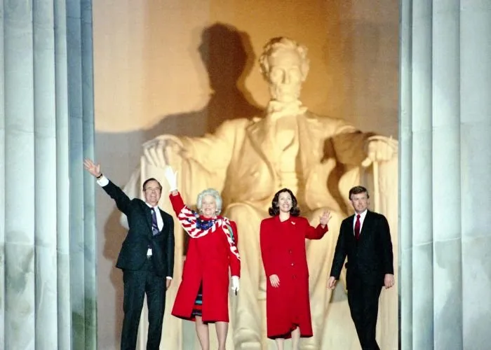 President-elect and Mrs. Bush with VP-elect and Mrs. Quayle wave from the steps of the Lincoln Memorial during the Inaugural opening ceremony