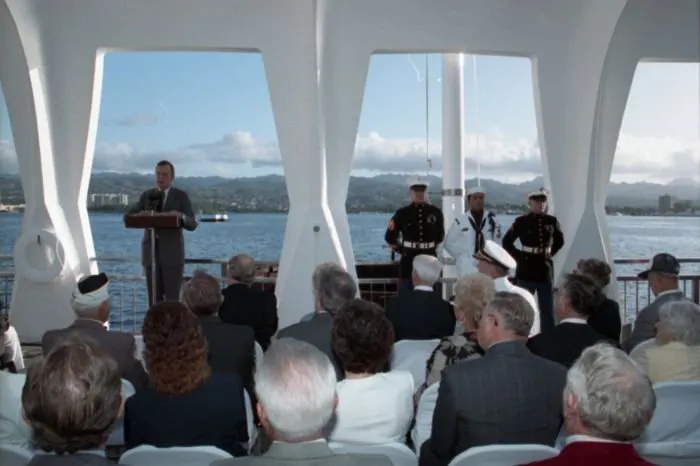 President Bush gives a speech at the USS Arizona Memorial during a ceremony commemorating the 50th anniversary of the Japanese attack on Pearl Harbor.