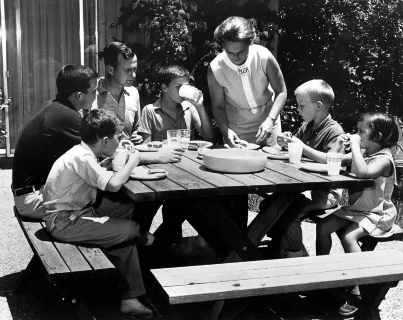 The George Bush family enjoys a meal during the campaign for the Senate, Houston, TX