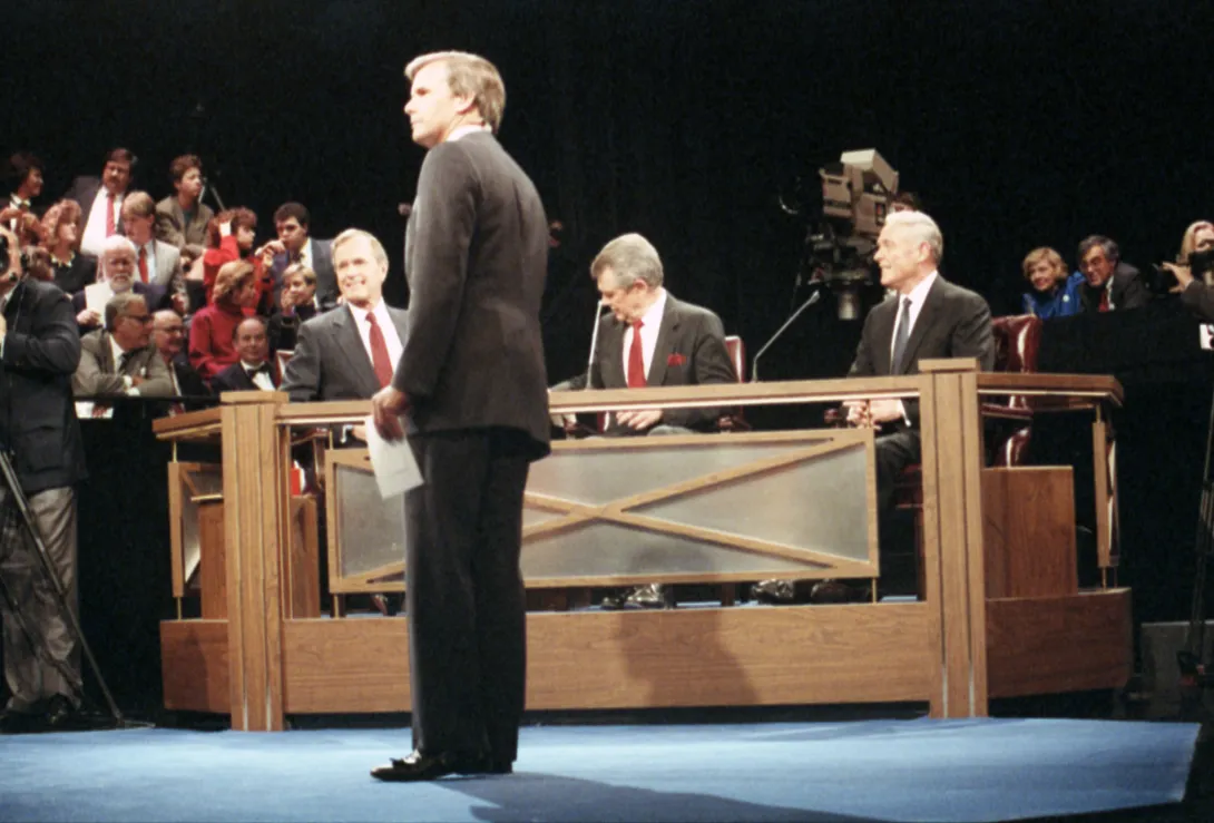 Vice President George Bush participates in a primary debate held in Washington, DC. Seated (L to R) are Vice President George Bush, Reverend Pat Robertson, and Secretary Alexander Haig.  Tom Brokaw is the moderator