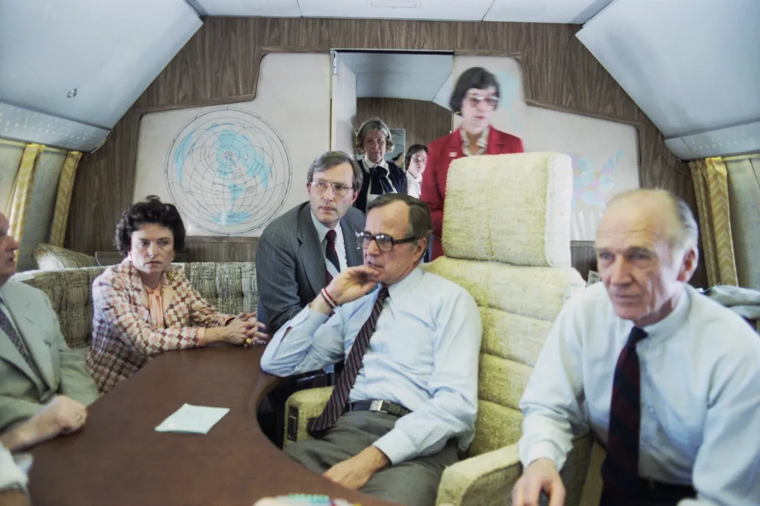 Vice President Bush on Air Force 2 heading back to Washington, DC after the assassination attempt on President Reagan