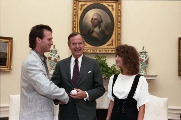 President Bush meets with Nick Esasky and his wife in the Oval Office