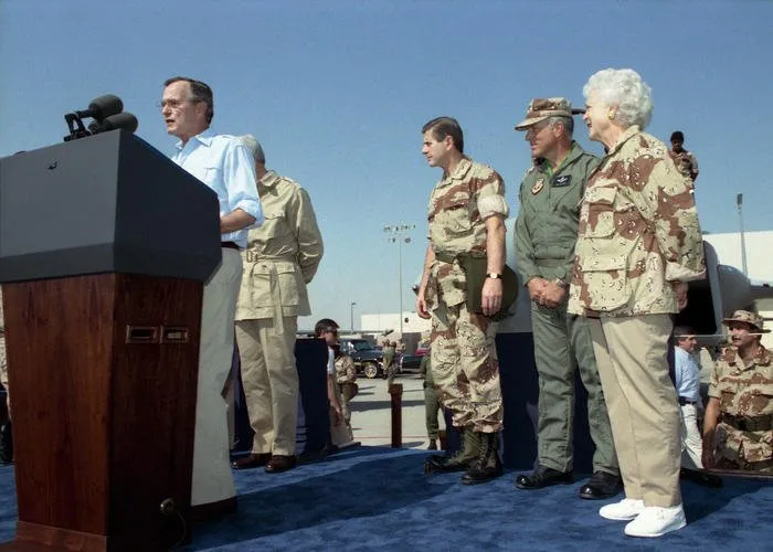 President and Mrs. Bush greet U.S. and allied Air Force personnel of the Military Air Command, Dhahran, Saudi Arabia