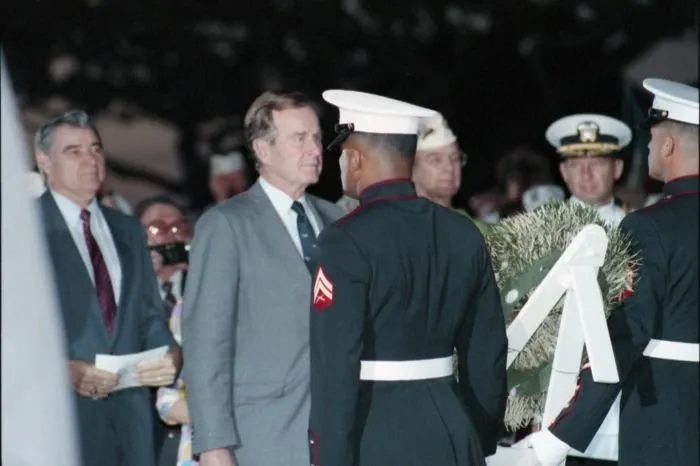 President Bush lays a wreath at a monument in the National Memorial Cemetery of the Pacific (aka The Punchbowl) honoring service members who are missing in action.