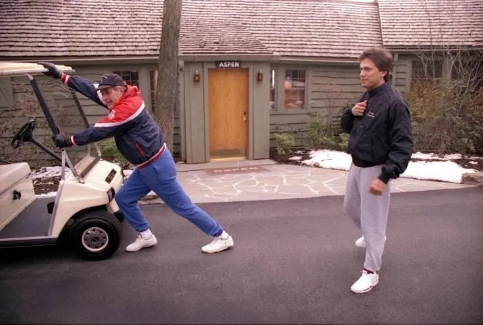 President Bush prepares to jog with George Strait at Camp David