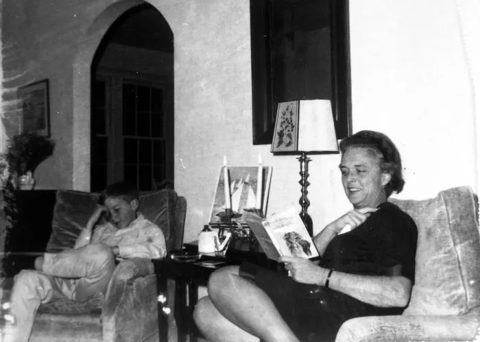 Barbara Bush Reads as Son, Neil, Studies in their Home in Washington, DC
