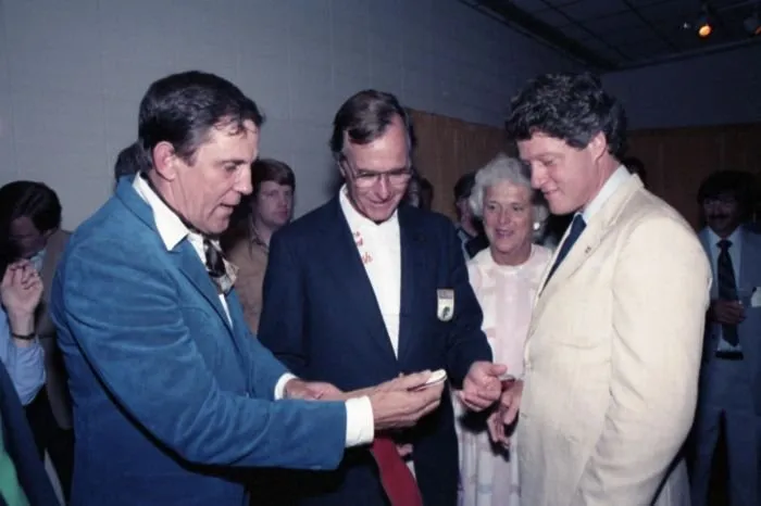 Vice President and Mrs. Bush with Arkansas Governor Bill Clinton and Ray Scott at the Bass Anglers Tournament in Pine Buff, Arkansas