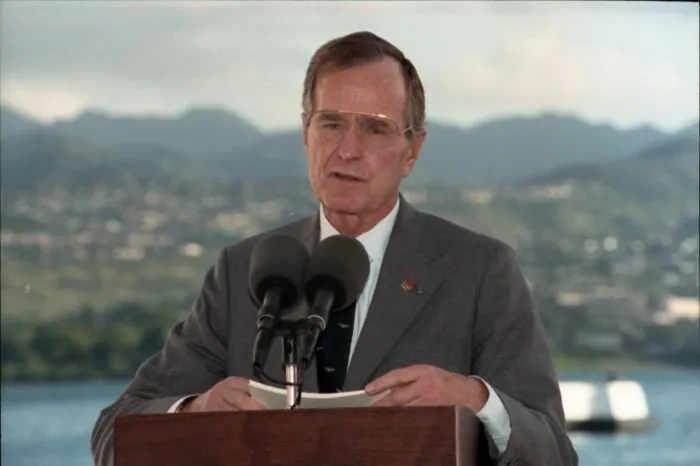 President Bush gives a speech at the USS Arizona Memorial during a ceremony commemorating the 50th anniversary of the Japanese attack on Pearl Harbor.