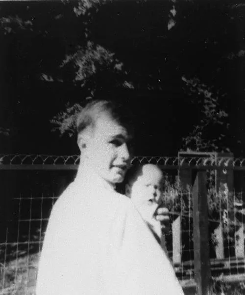 George Bush Holds his Son, George W. Bush.