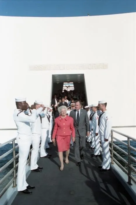 President and Mrs. Bush exit the USS Arizona Memorial after attending ceremonies commemorating the 50th anniversary of the Japanese attack on Pearl Harbor.