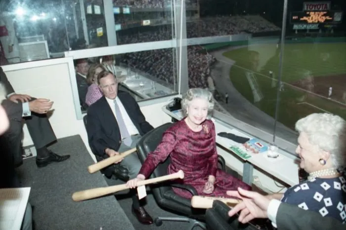 President Bush,  Queen Elizabeth II, and Barbara Bush are given baseball bats