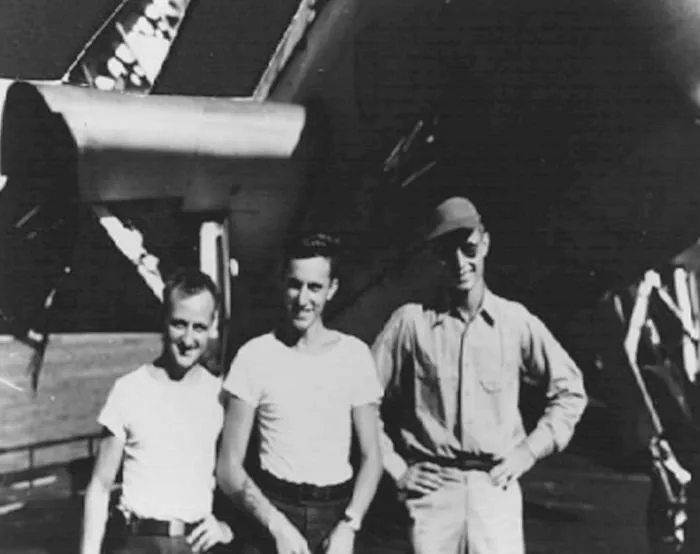 George Bush's flight crew, US Navy. (L t R) John Delaney, Leo Nadeau, and George Bush, circa August 1942 to September 1942