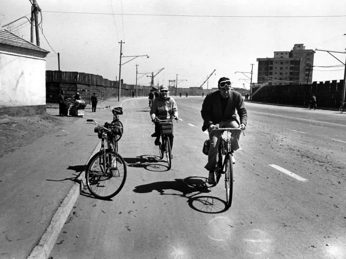 George Bush and Barbara Bush Ride Bikes in China