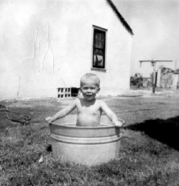 George W. Goes Swimming in the Wash Tub, Midland, Texas
