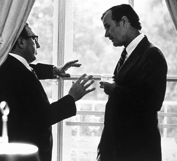 George Bush with Henry Kissinger in China