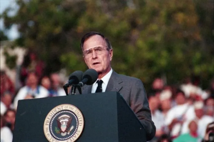 President Bush addresses Pearl Harbor Survivors at the National Memorial Cemetery of the Pacific during a ceremony commemorating the 50th anniversary of the Japanese attack on Pearl Harbor.