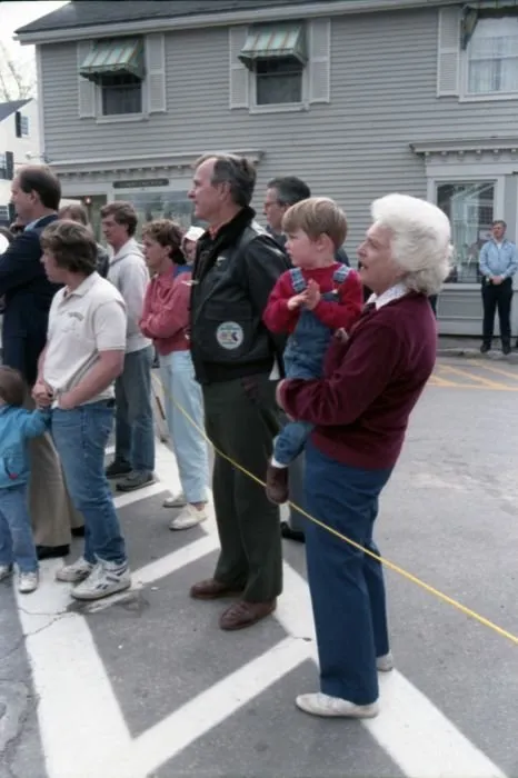 Vice President Bush watches the Memorial Day parade with his family in Kennebunkport, Maine