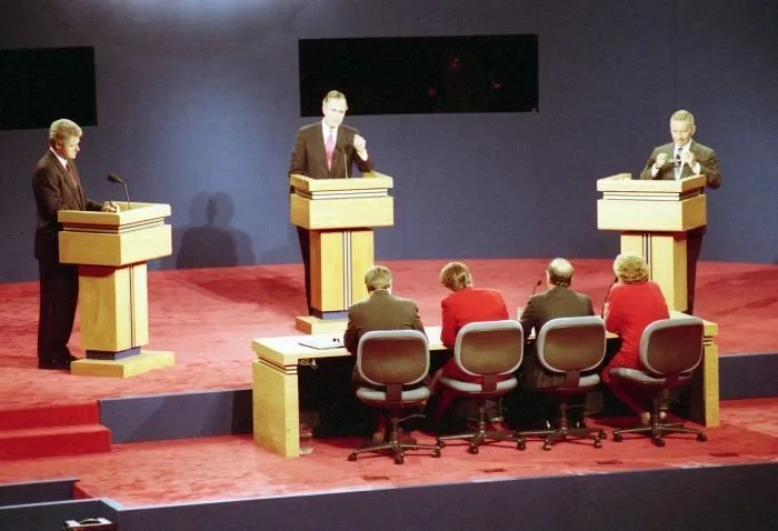 President Bush participates in the third and final Presidential Debate between himself, Governor Bill Clinton, and Ross Perot in East Lansing, Michigan