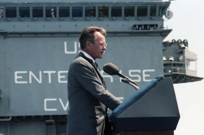Vice President Bush addresses the audience aboard the USS Enterprise in San Francisco Bay during the "Peace in the Pacific" ceremony marking the 40th Anniversary of VJ Day