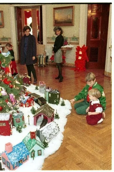 Grandchildren around Christmas Tree