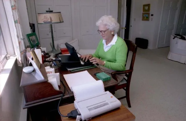 Mrs. Barbara Bush works at her desk at Walker's Point, Kennebunkport, Maine