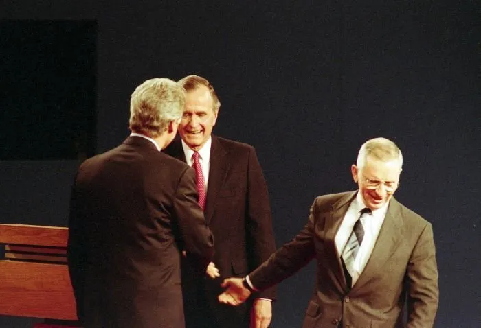 President Bush participates in the third and final Presidential Debate between himself, Governor Bill Clinton, and Ross Perot in East Lansing, Michigan