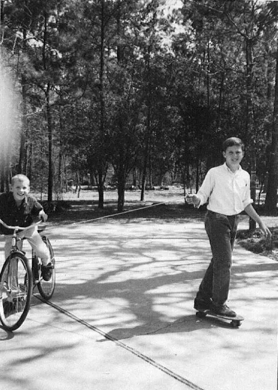 Neil on Bicycle and Jeb Bush on Skateboard
