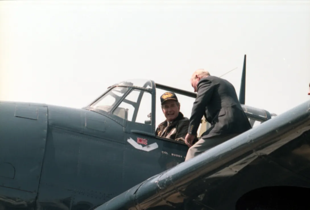 Vice President George Bush sits in the cockpit of a TBF Avenger during ceremony at Naval Station Norfolk, Virgina commemorating the 40th anniversary of the day he was shot down over Chi Chi Jima and rescued by the USS Finback  on September 2, 1944.