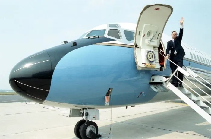 Vice President Bush boards Air Force II as he departs Dayton, Ohio, while on the campaign trail